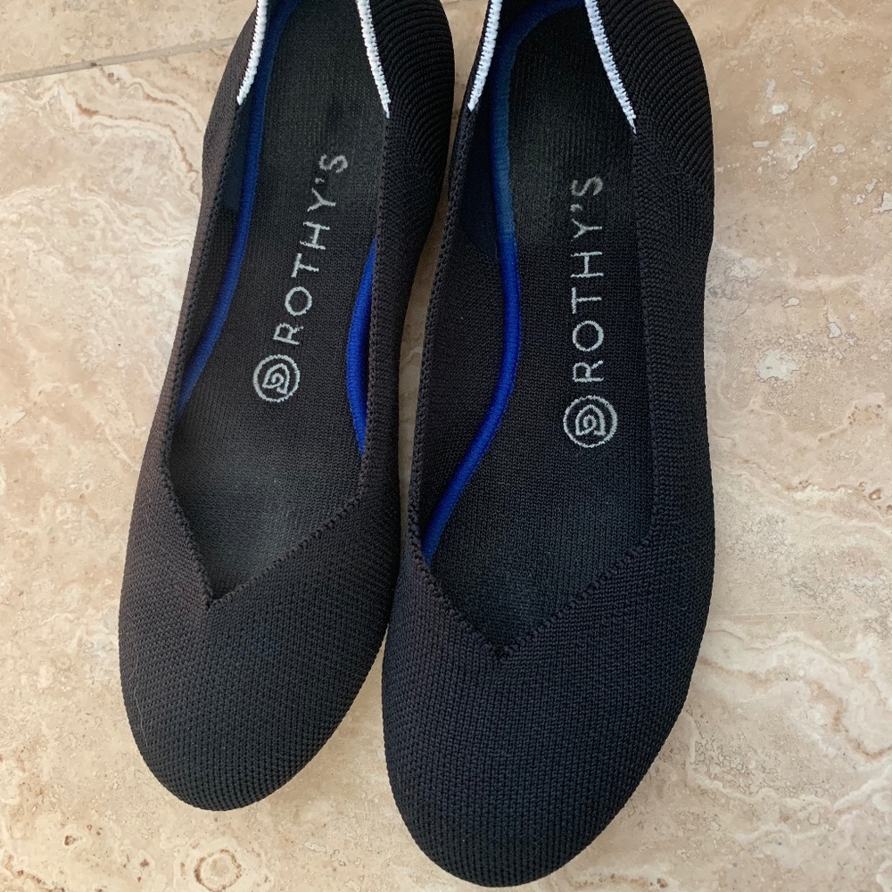 Rothy's round toe black flats, with insoles